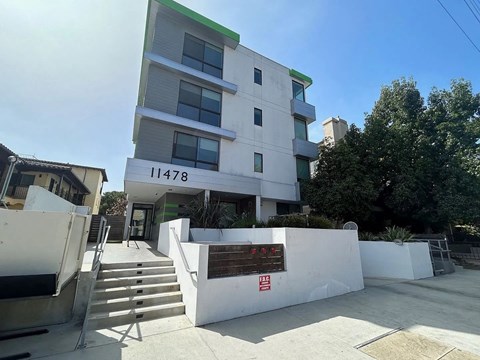 A white building with the number 11478 on it.