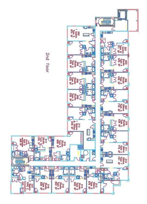 A floor plan of a building with rooms and corridors labeled in red and blue text.