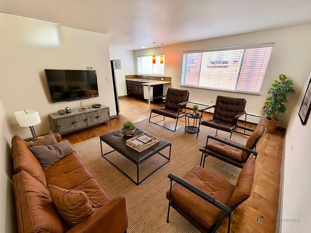 A red brick building with the number 65 on it.