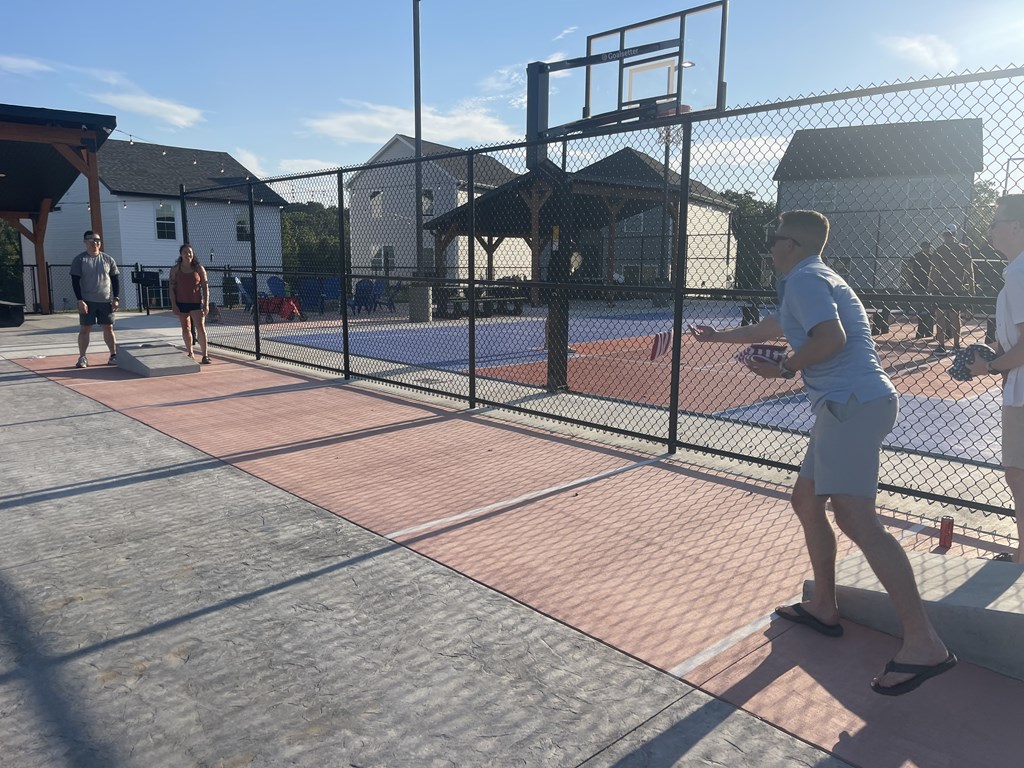 A spacious home gym with a variety of exercise equipment.