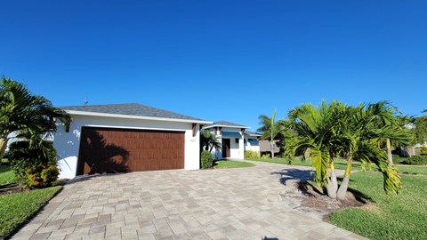 A house with a driveway and a garage.