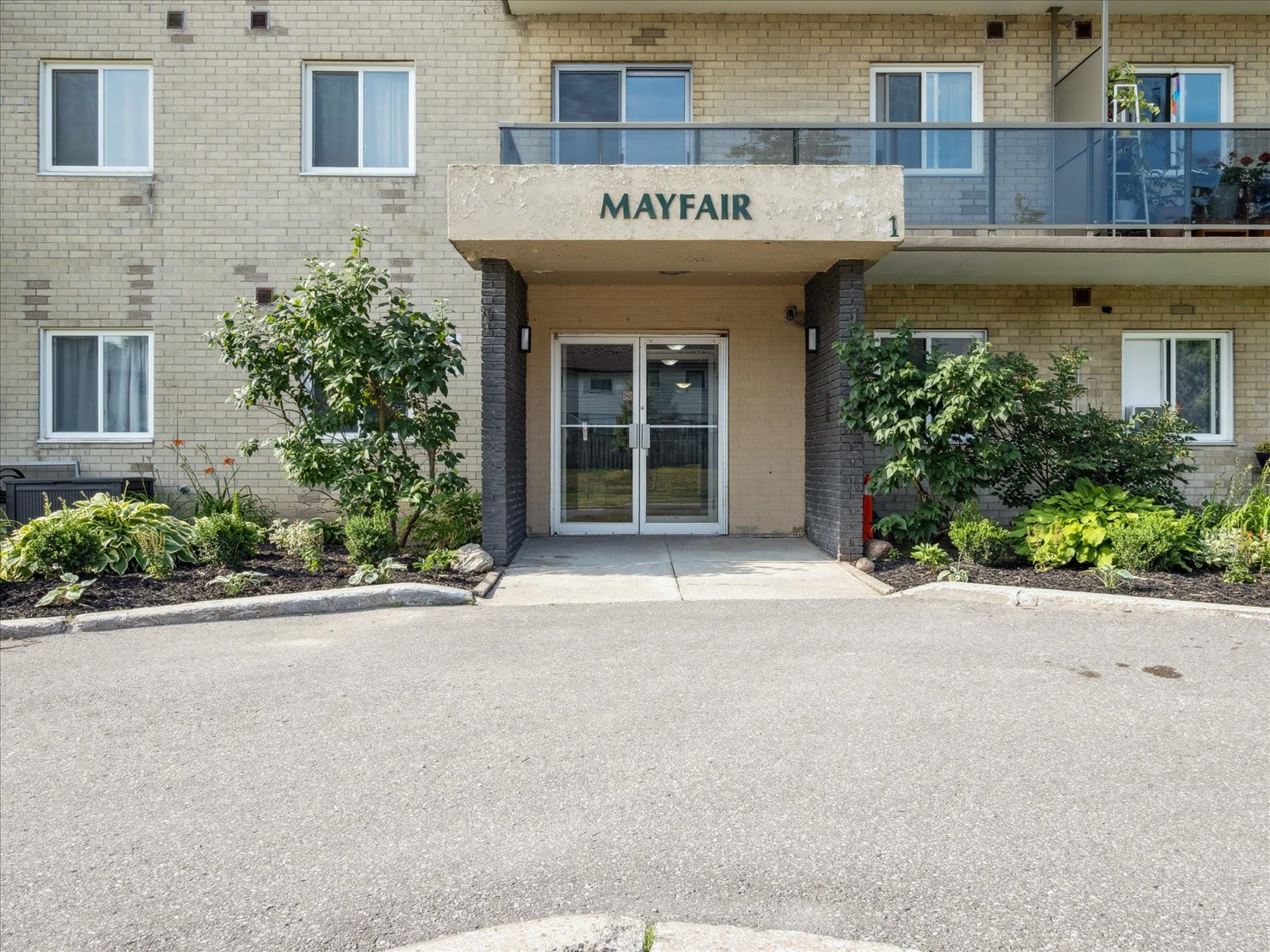 The front of a building with the word "Mayfair" on it.