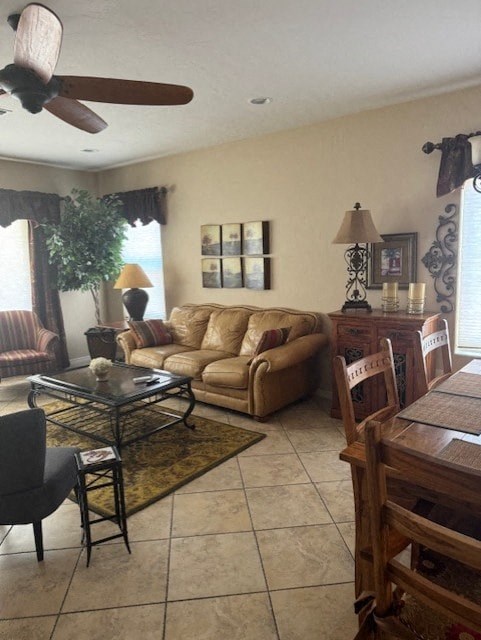 A living room with a couch, chairs, and a dining table.