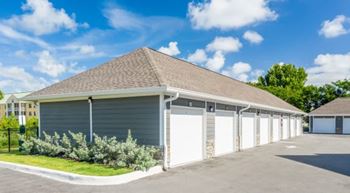 A row of garage doors are closed at Mode at Melbourne, LLC Apartments, Florida, 32901