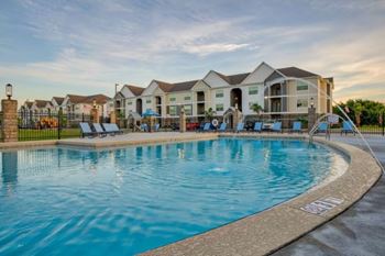 A large swimming pool at Mode at Melbourne, LLC Apartments, Melbourne, FL, 32901