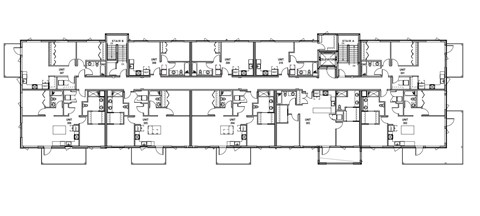 A black and white floor plan of a building with multiple rooms and corridors.