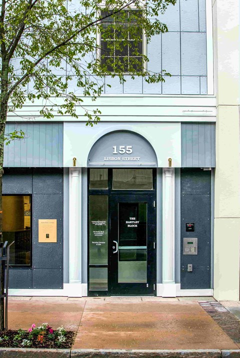 The front of a building with the number 155 on it.