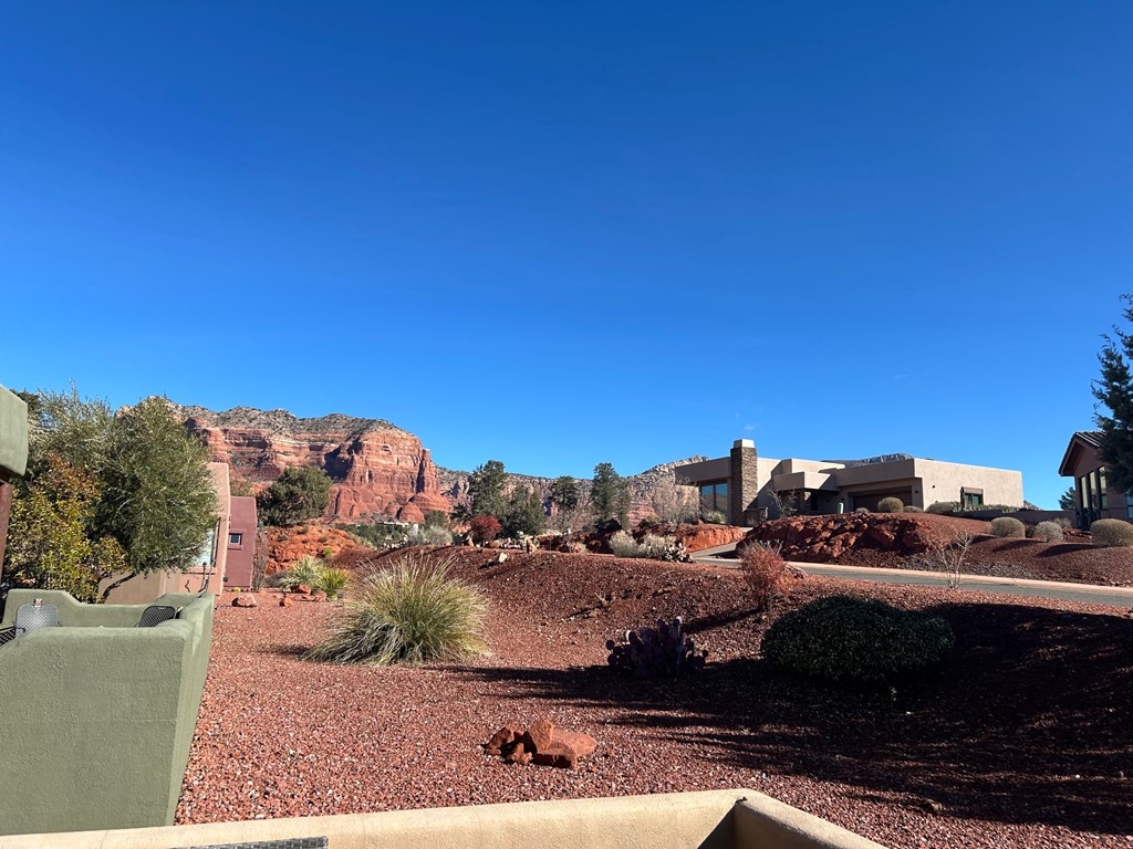 A house is situated in a desert landscape.