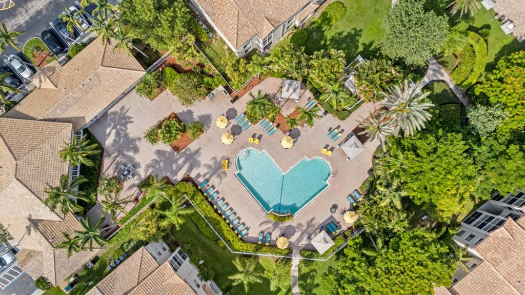 A heart-shaped pool in the middle of a residential area.