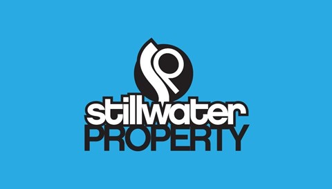 The image shows a logo with the text "stillwater PROPERTY" and a stylized water droplet design.