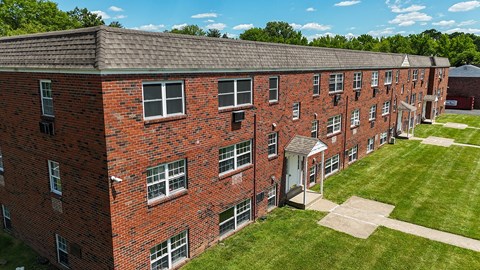 A room with carpeted floor and white walls.
