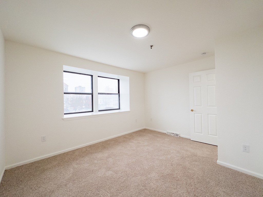 A large, old building with many windows and balconies.