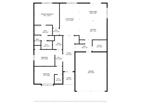 A floor plan of a house with a primary bedroom, garage, and two bathrooms.