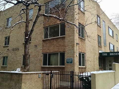 A brick building with a sign that says "The Birney".