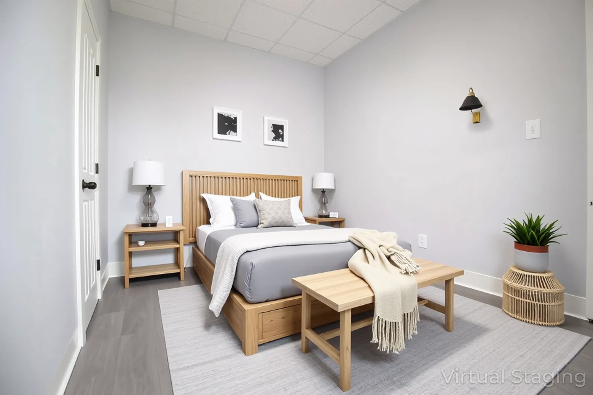A bedroom with a bed, nightstands, and a bench.