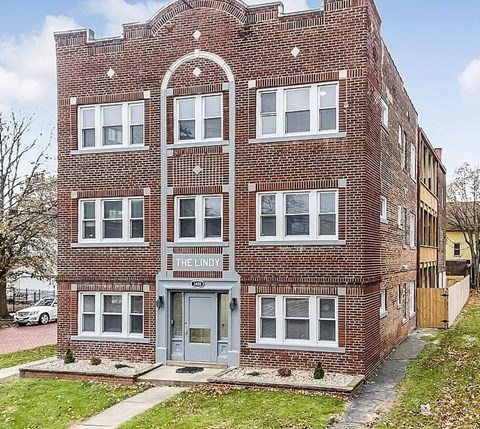 A brick building with the name "The Lindy" on the front.