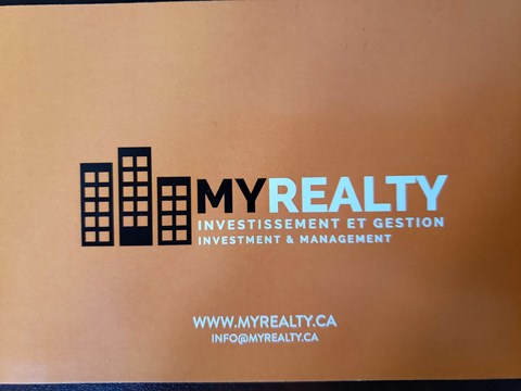 A sign for MYREALTY INVESTMENT ET GESTION on a wall.