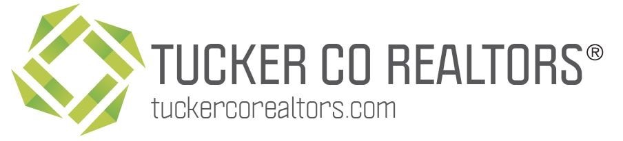 The image is a logo for Tucker Co Realtors.