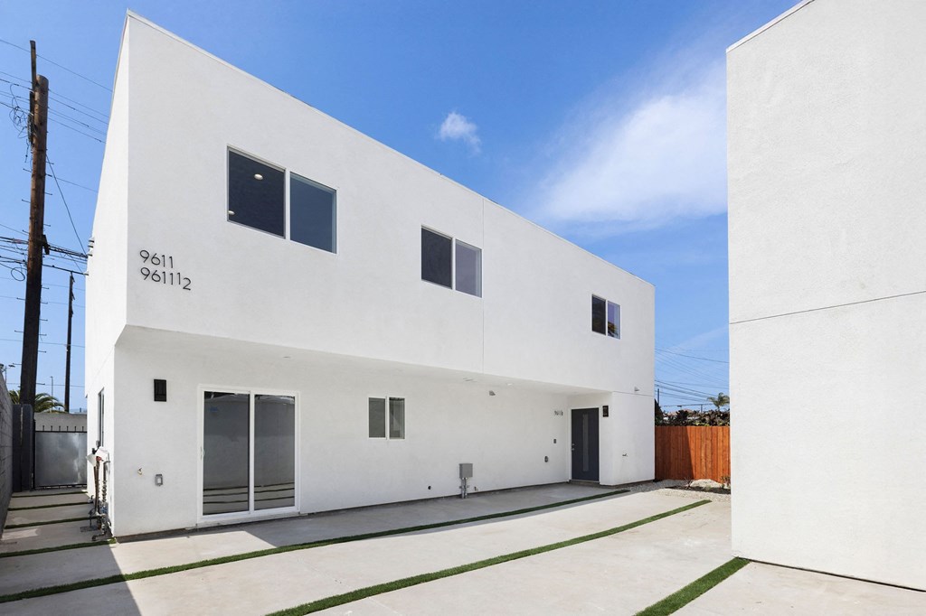 A white building with the number 96112 on the side.