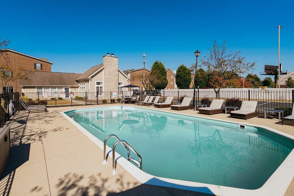 A living room with a fireplace and a couch.