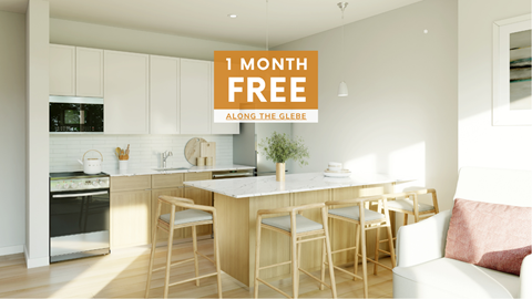 A kitchen with a counter and chairs and a sign that says 1 month free.