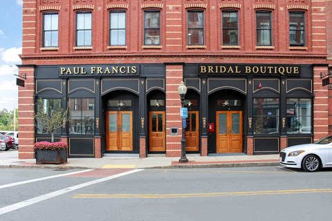 Paul Francis Bridal Boutique is a storefront with two doors and a sign above.