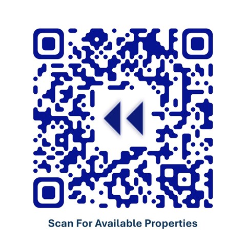 A QR code with a play button and the text "Scan For Available Properties" below it.