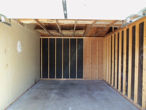 A room under construction with wooden framing.