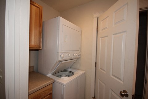 A white oven and stove in a kitchen.