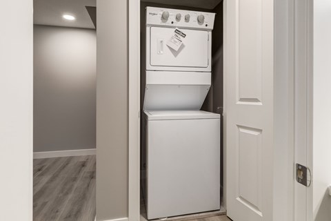 A white dishwasher is installed in a kitchen.