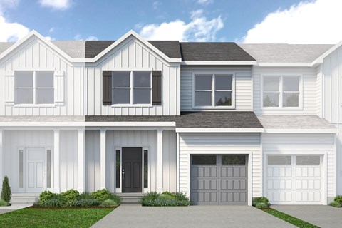 A white house with a black door and windows.