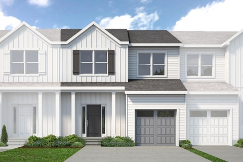 A white house with a black door and windows.