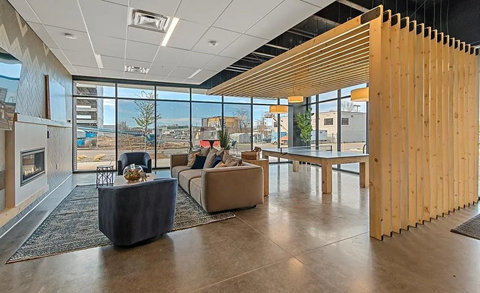 A modern living room with a view of the city.