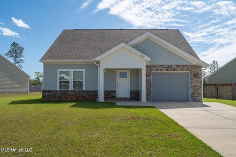 A house with a garage is for sale by MLS United LLC.