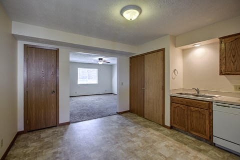 A room with a sink and a window.
