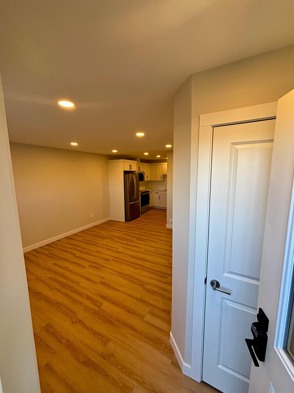 A white door is on the right side of the image.