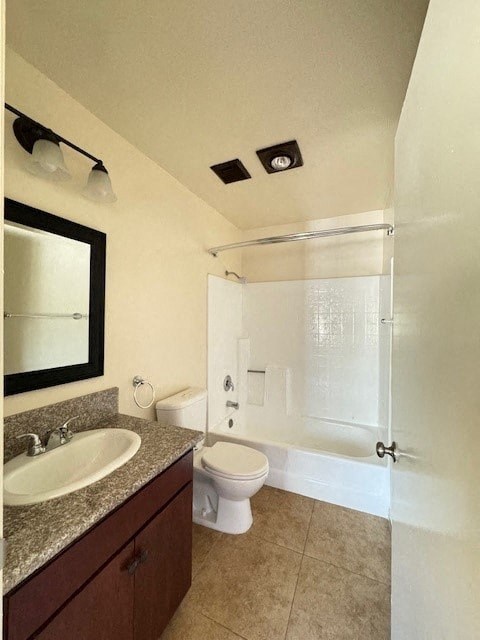 A bathroom with a toilet, sink, and shower.