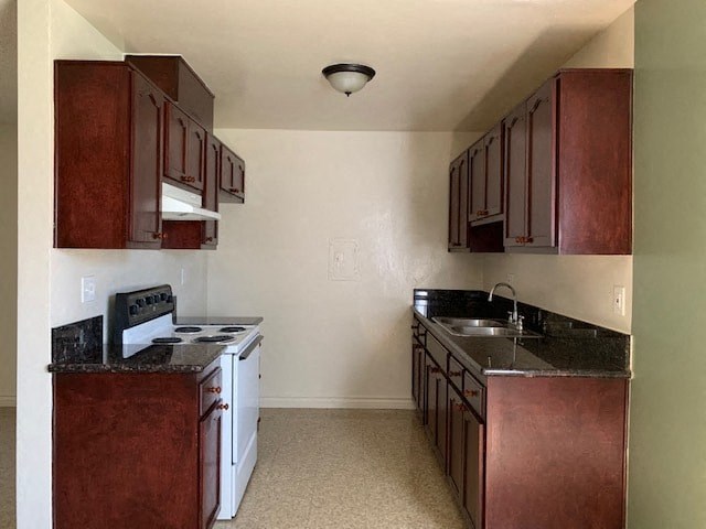 A kitchen with brown cabinets and a black stove top oven.