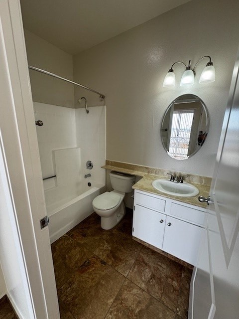 A bathroom with a toilet, sink, and mirror.