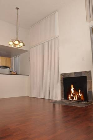 A fireplace with a fire burning in it.