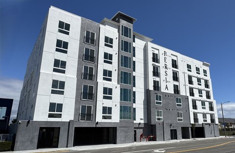 A large white building with the words "Peers Pl" on the side.