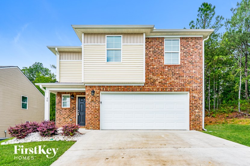 A two-story house with a garage is for sale by FirstKey Homes.