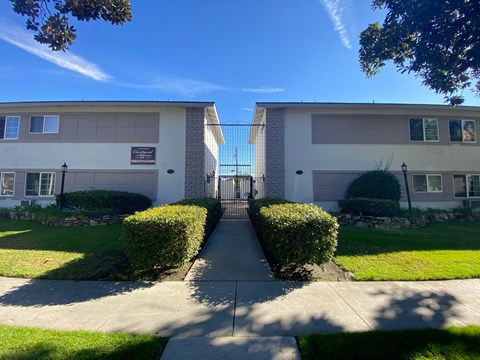 A building with a gate in front of it.