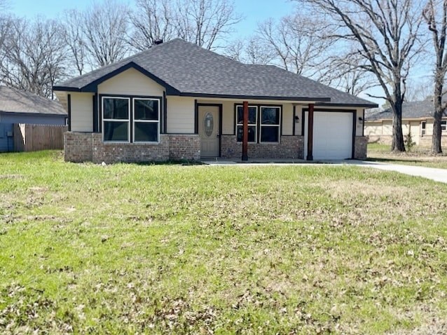 A small house with a grey roof and a white garage door.