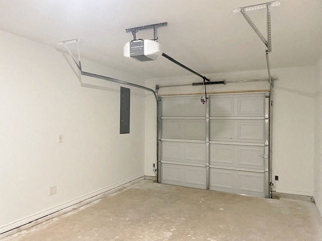 A garage with a white door and a light on the ceiling.