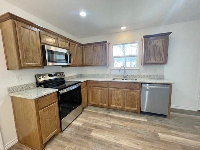 A kitchen with wooden cabinets and a granite countertop.