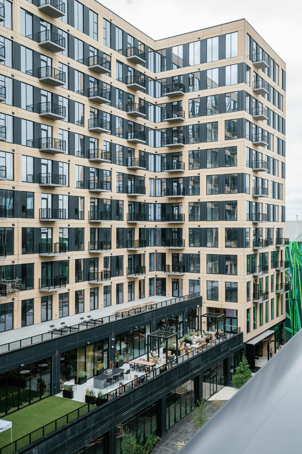 A modern building with a lot of windows and balconies.