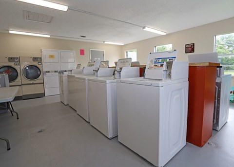 A laundromat with washers and dryers.