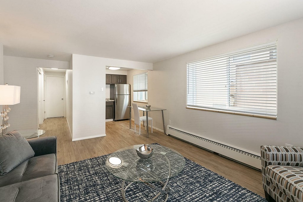 A kitchen with wooden cabinets and stainless steel appliances.