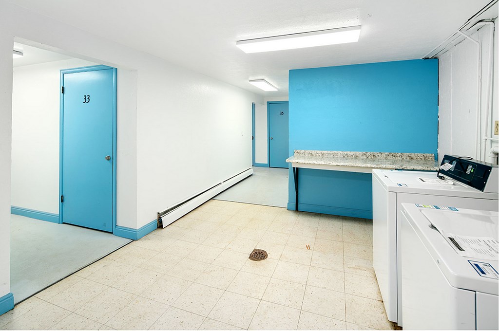 A laundry room with a washer and dryer.
